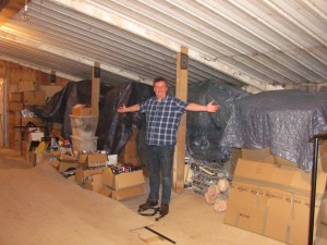 David With Boxes of Collectibles at the Museum's Location